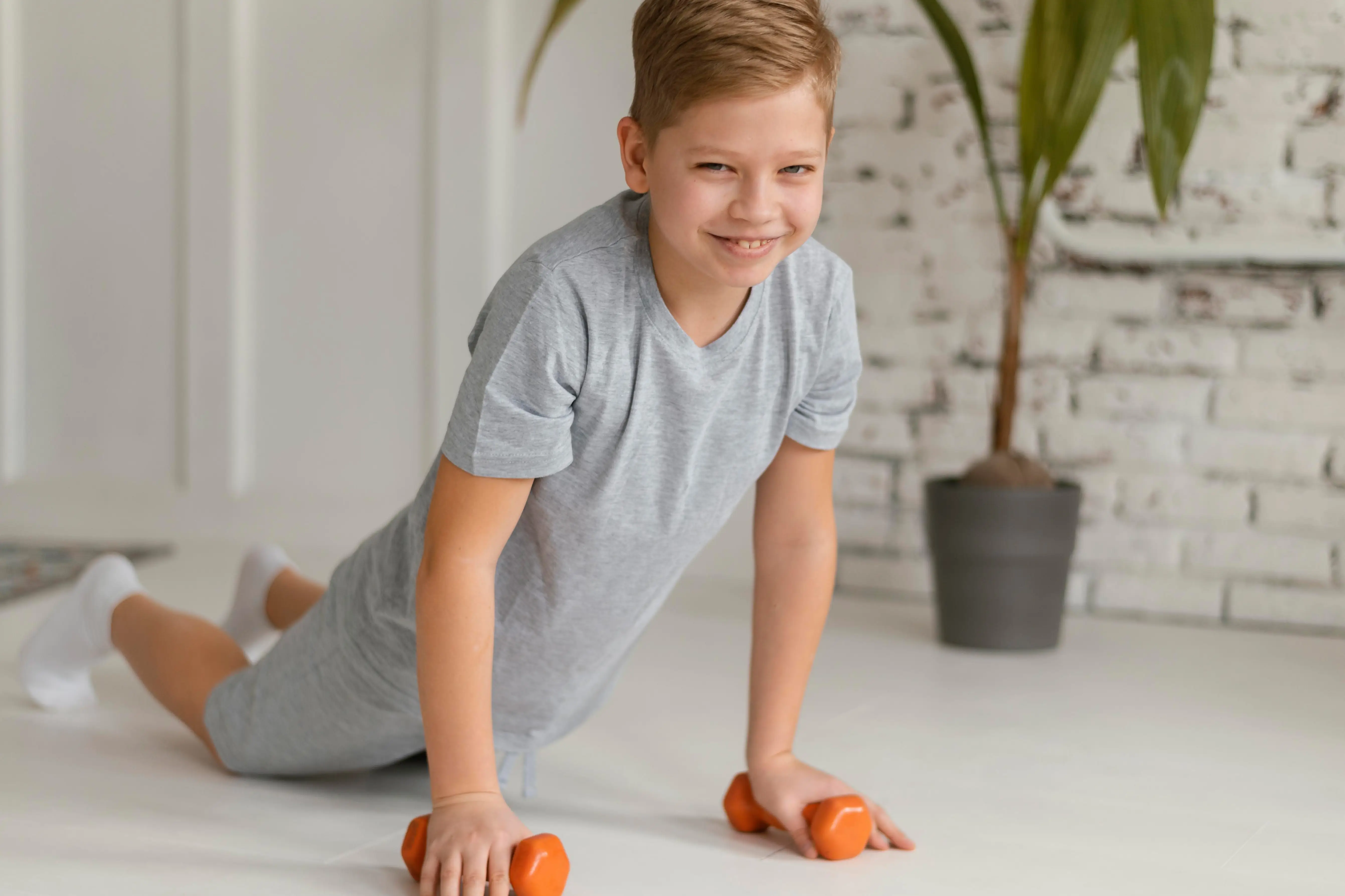 Young person practising a guided mobility exercise session